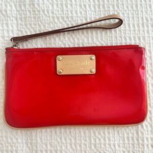 Classic Red Kate Spade Patent Leather Wristlet/Clutch with Newspaper Lining